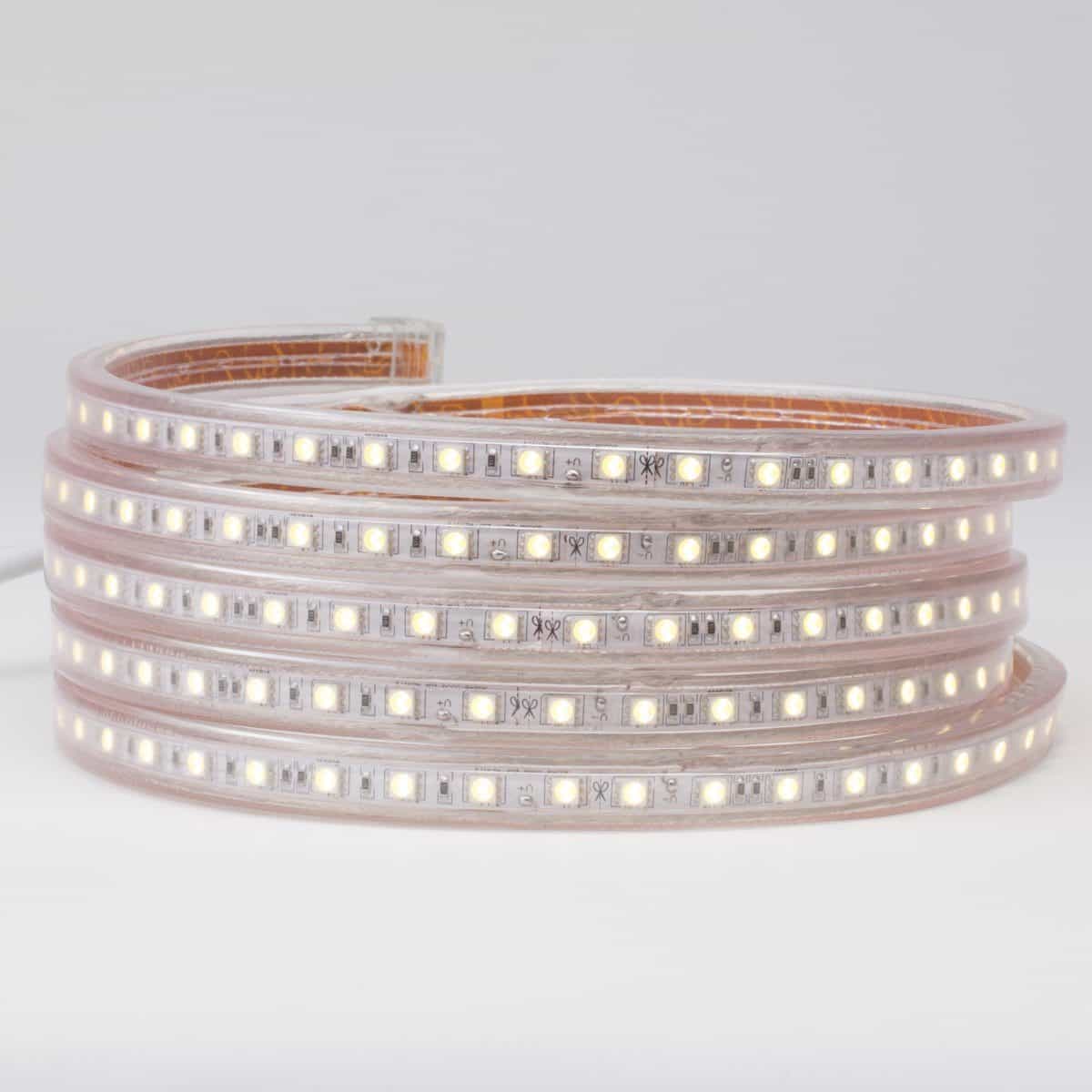 120V led strip lights on white background coiled five times with illuminated white color led chips and cap seal at end