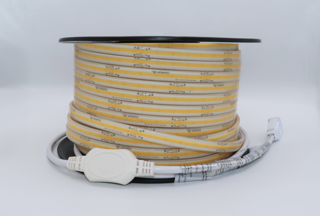 cob led strip off, coiled and showing power cord from Lumilum