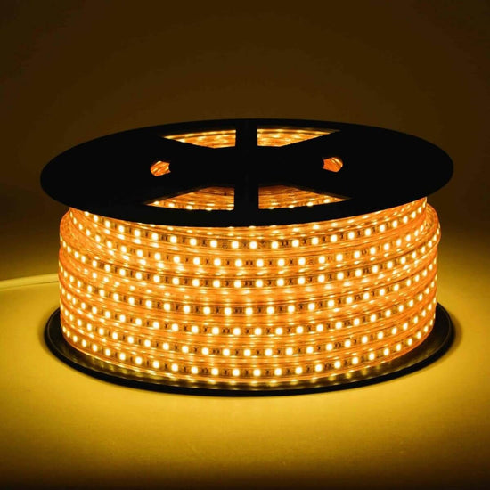 120V led strip lights on black reel displaying vivid light in intense 2200k warm white color