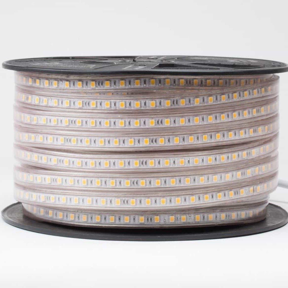 Load image into Gallery viewer, led strip light with visible yellow led chips wound tightly on black reel
