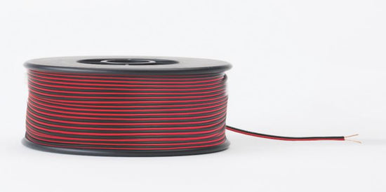 spool of red and black 2 conductor wire on black reel