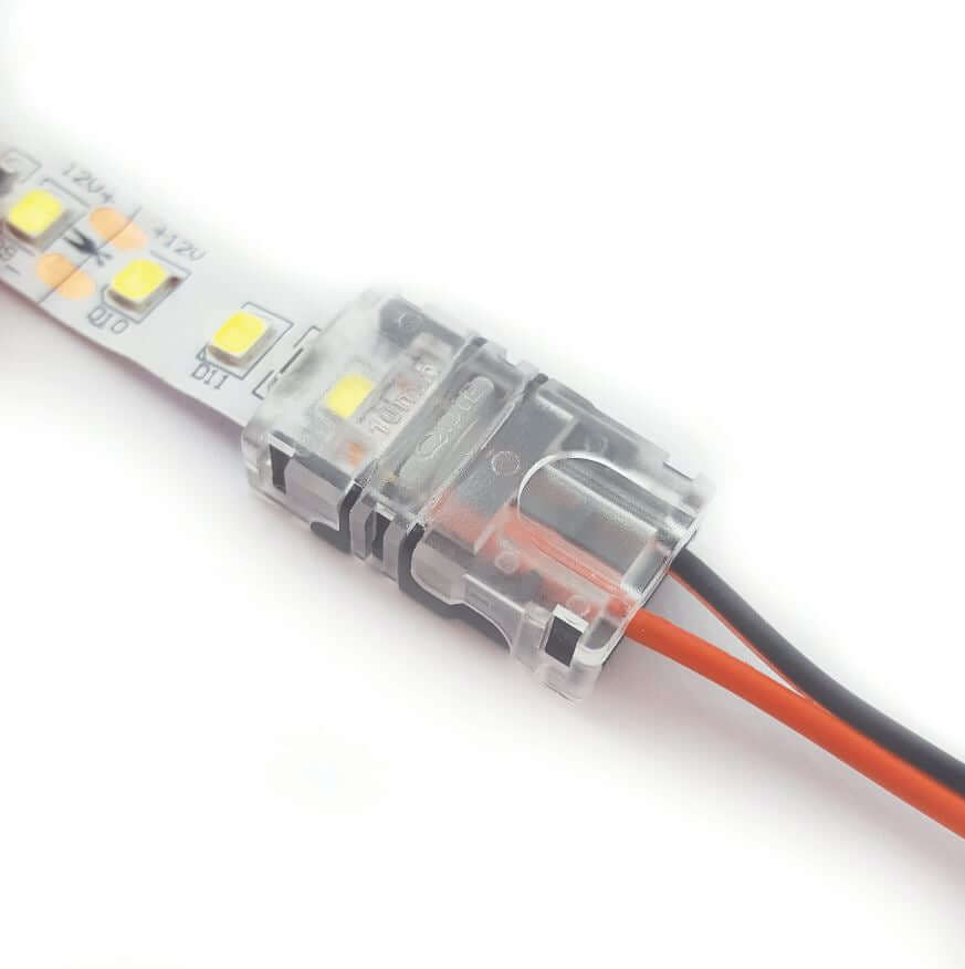 clear led strip light clips with led strip out of one end and red and black wire out the other