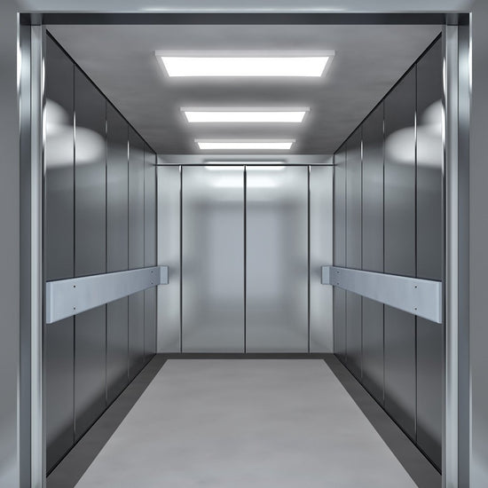 fully chrome elevator with open doors and flat panel led lights in ceiling